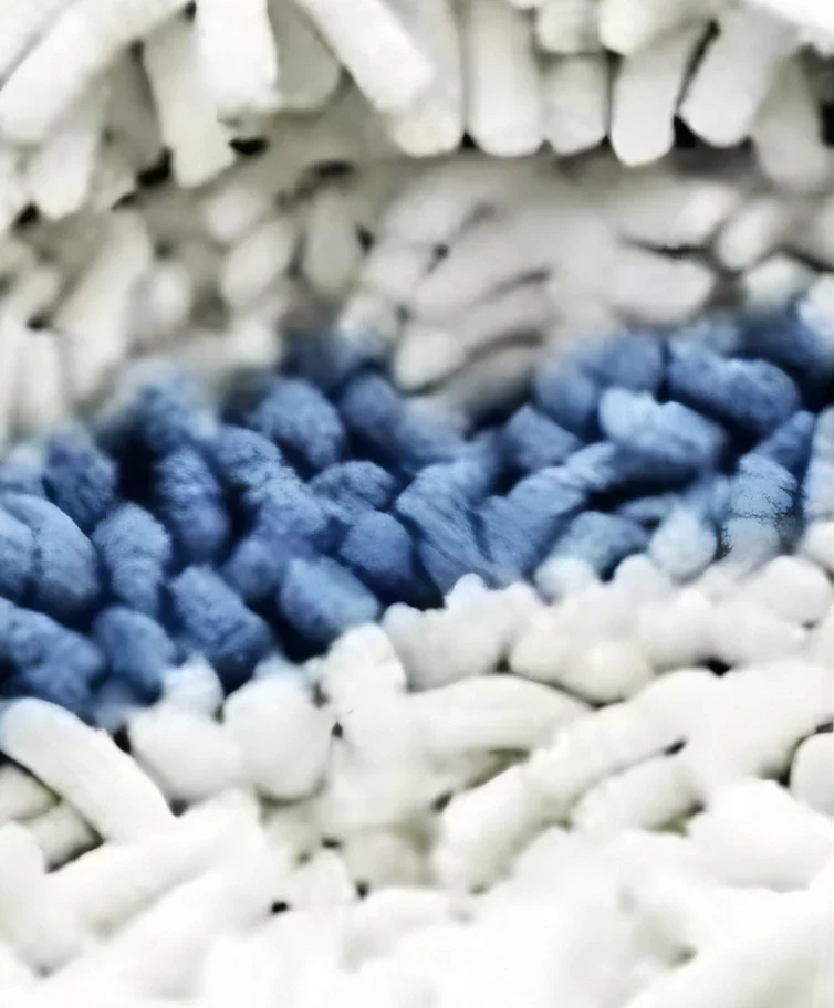 Close-up of navy and white chenille fibers